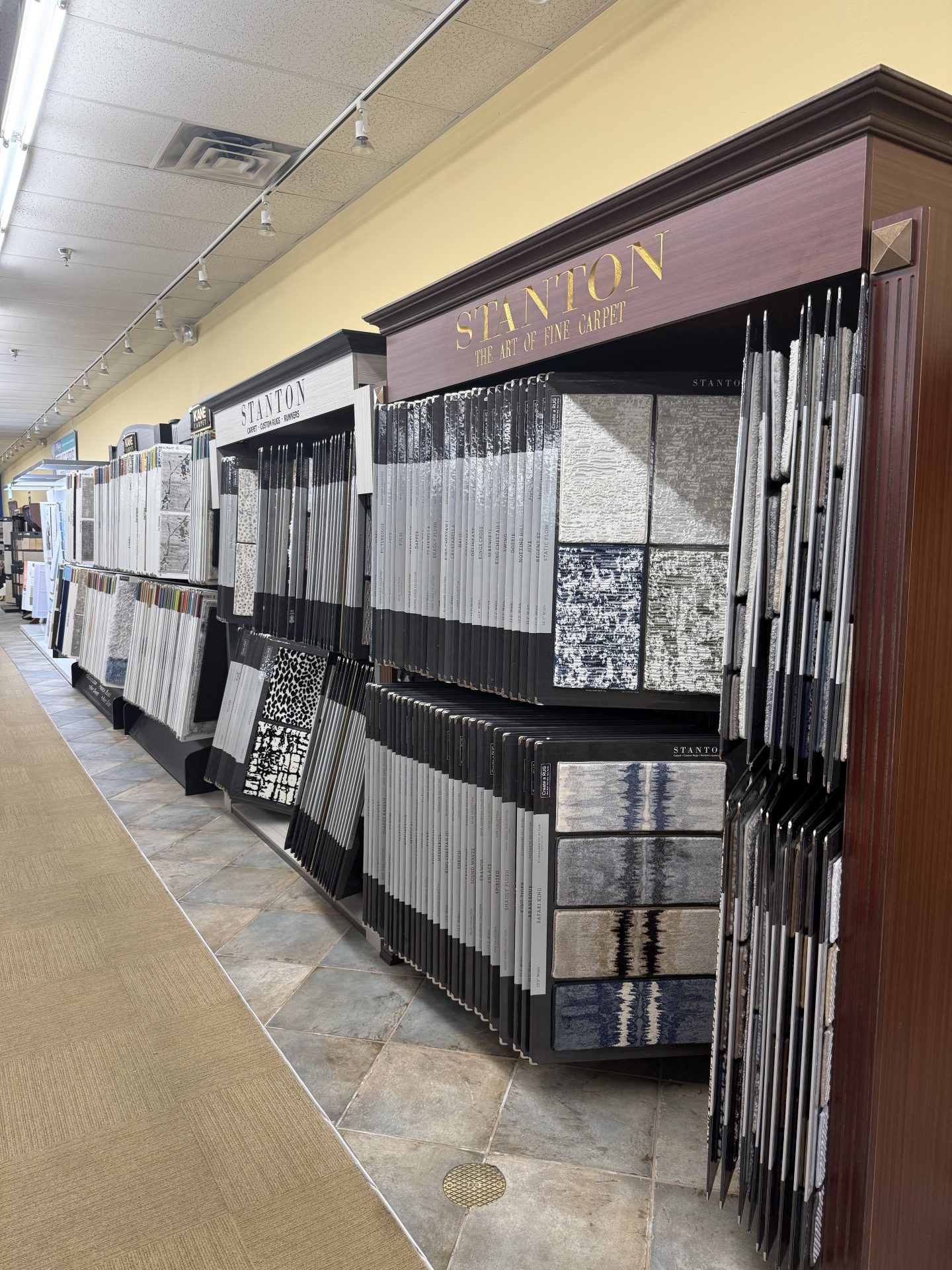 Carpet display wall in the wholesale showroom | McSwain Carpets & Floors