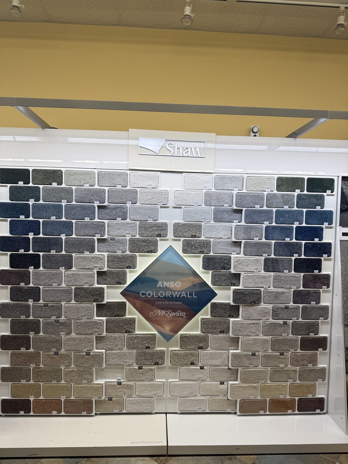 Color wall display in the wholesale showroom | McSwain Carpets & Floors